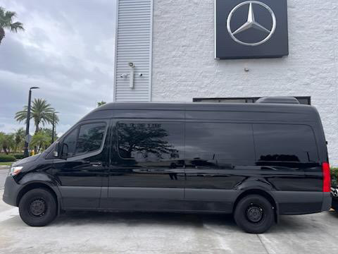 CityLyfe Mercedes Sprinter exterior - glossy black side profile
